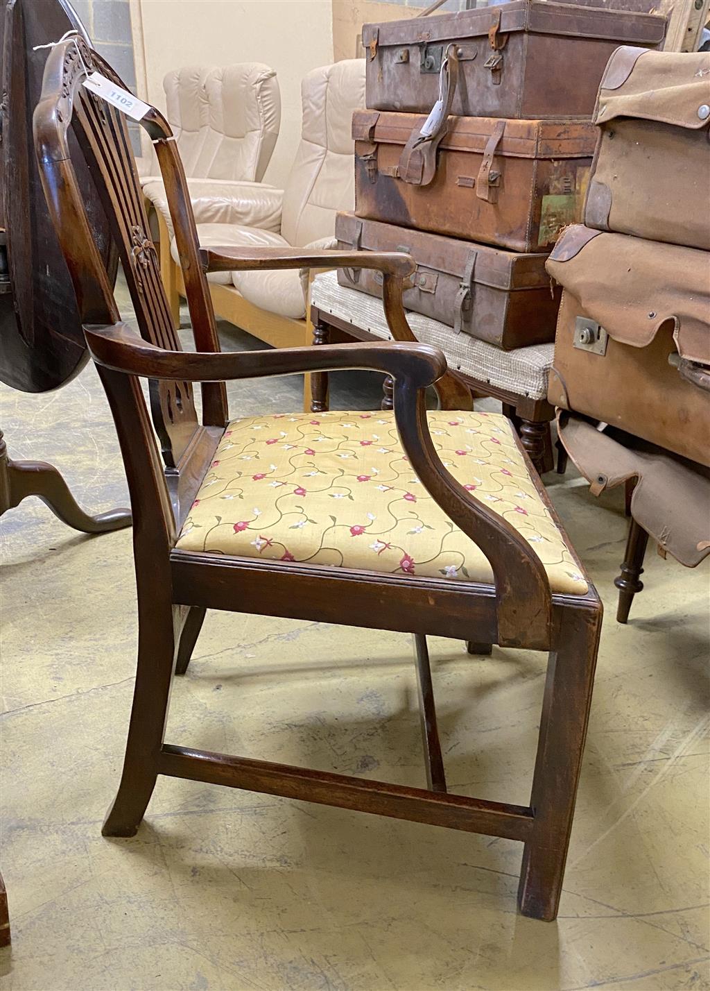 A George III Hepplewhite style mahogany elbow chair